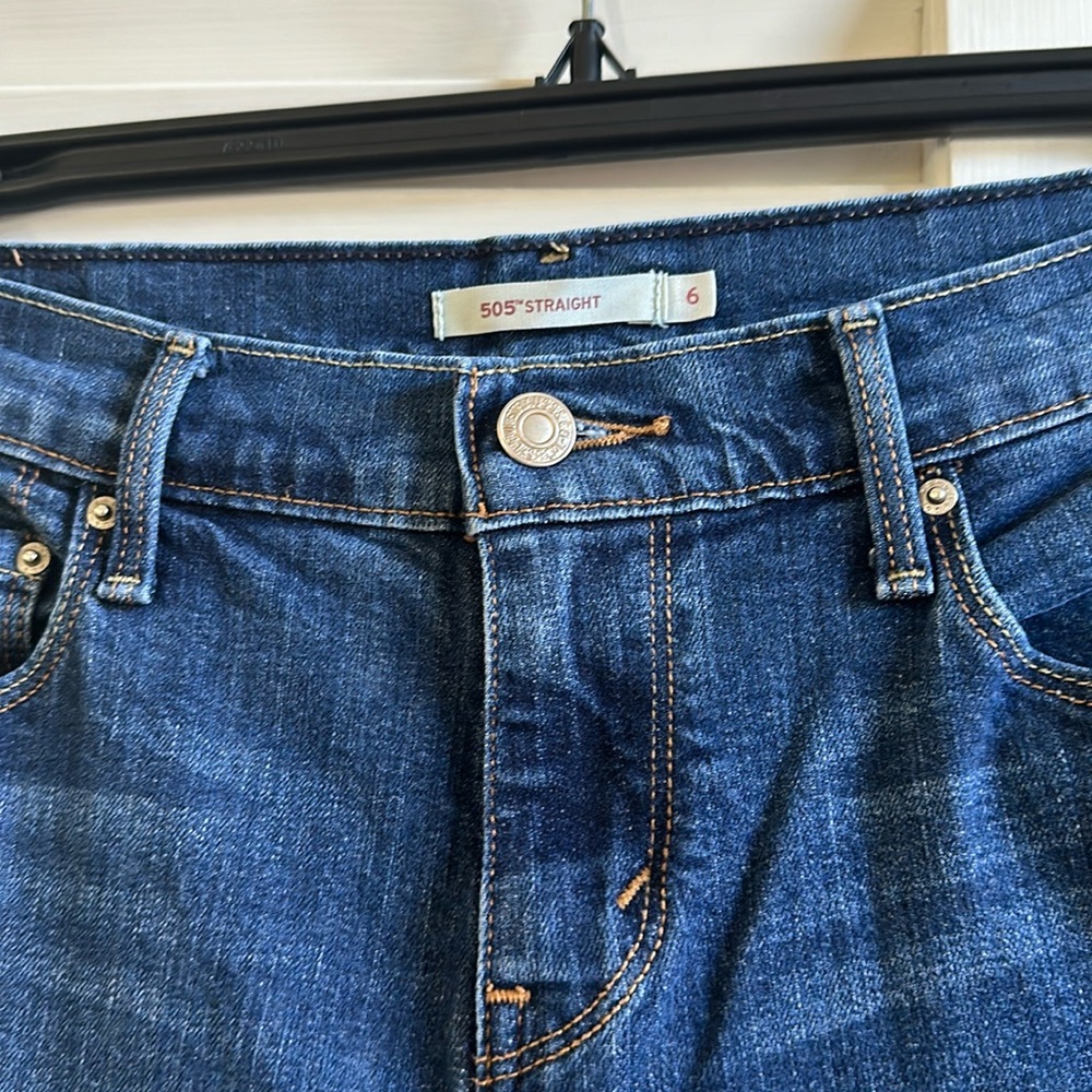 Levi’s 505 straight leg Jeans in medium/dark wash blue.